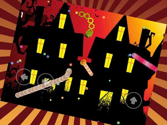 Изображение игры: Rolling Halloween Snake And Worm Slither Dot Eater